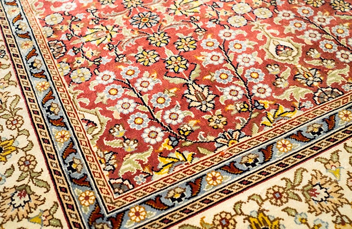 Colorful handmade silk rug cleaning