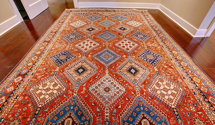 Antique rug placed on room