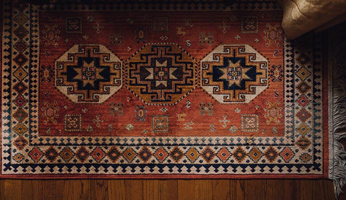 Smoke-damaged rug on floor Smoke-damaged rug on floor